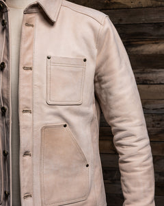 Close-up of the Field Jacket collar and upper chest area in Natural leather