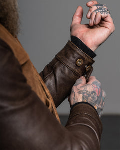 "The Scoundrel Jacket by Master Supply Co features a unique blend of heritage and tradition. This jacket is made from a combination of Full Grain Cow leather, providing a durable and stylish look. Perfect for those who appreciate a more traditional approach to fashion, the Scoundrel jacket is sure to make a statement. Upgrade your wardrobe today with this one-of-a-kind jacket."